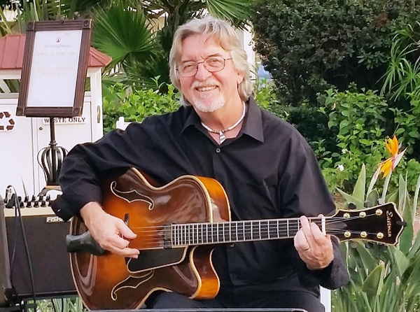 Solo jazz guitarist performing at a wedding event | Altus Entertainment